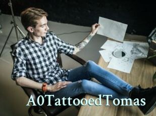 A0TattooedTomas